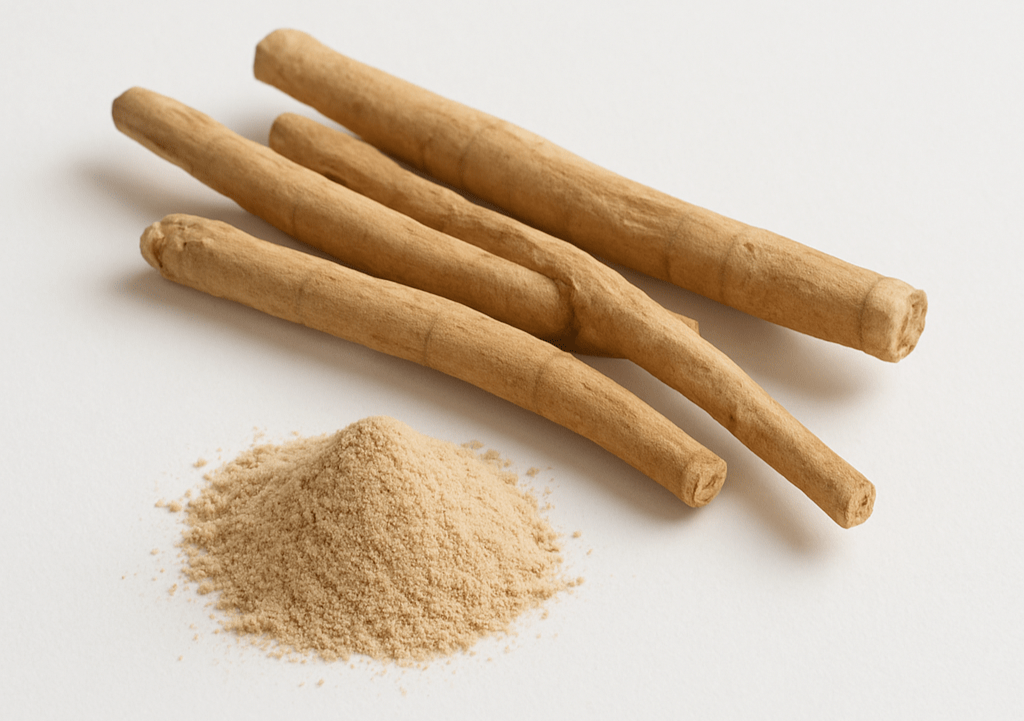 Brown sticks and ground brown powder on a white background